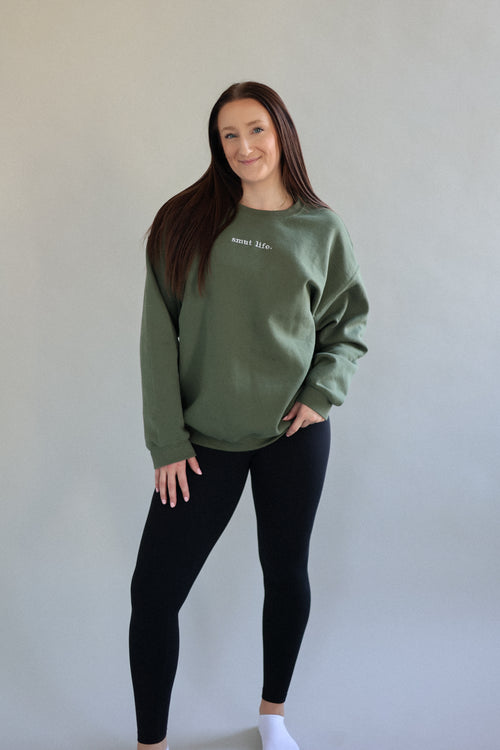 smut life. oversized crewneck in forbidden chapter (military green).