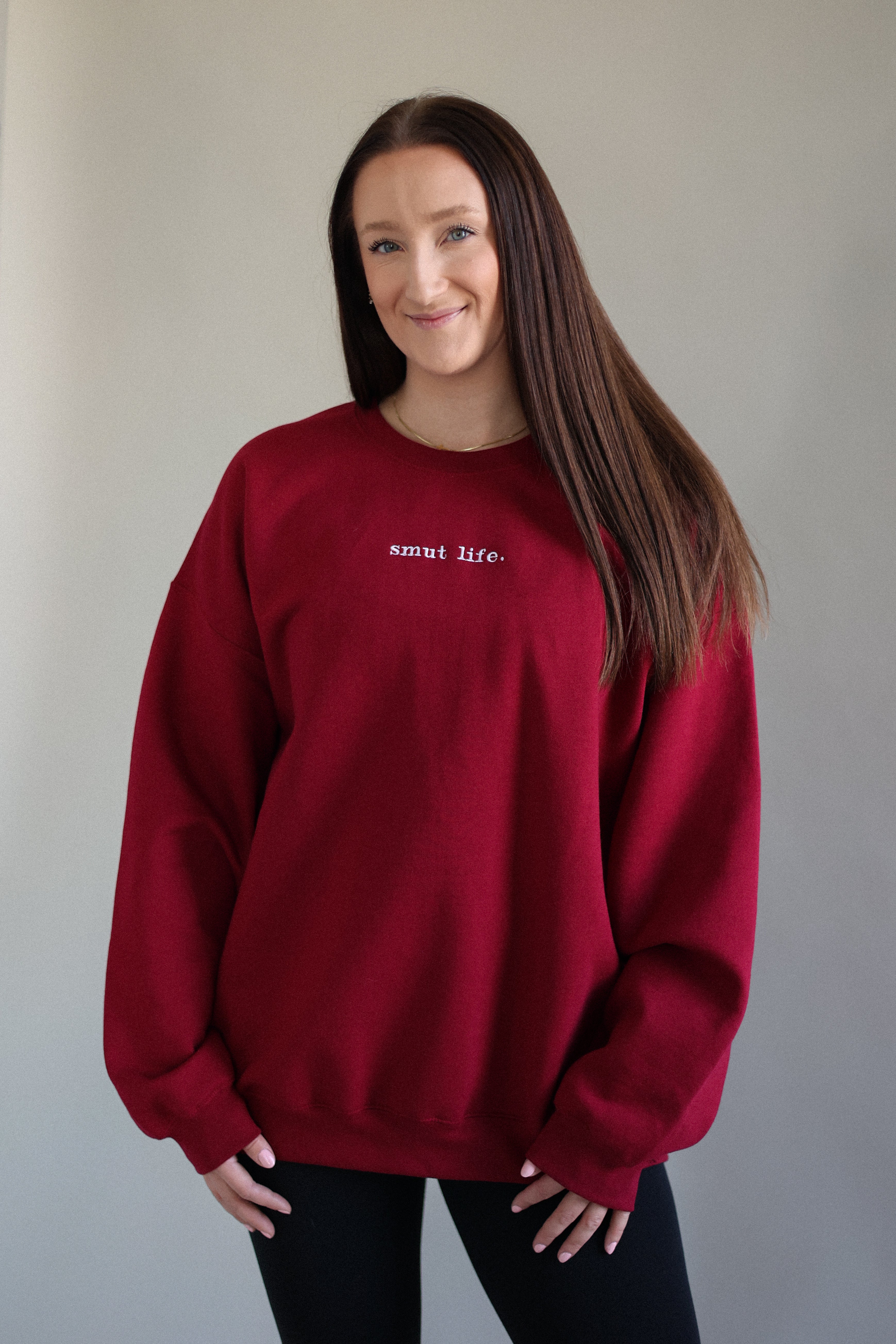 smut life. oversized crewneck in red flag (deep red)
