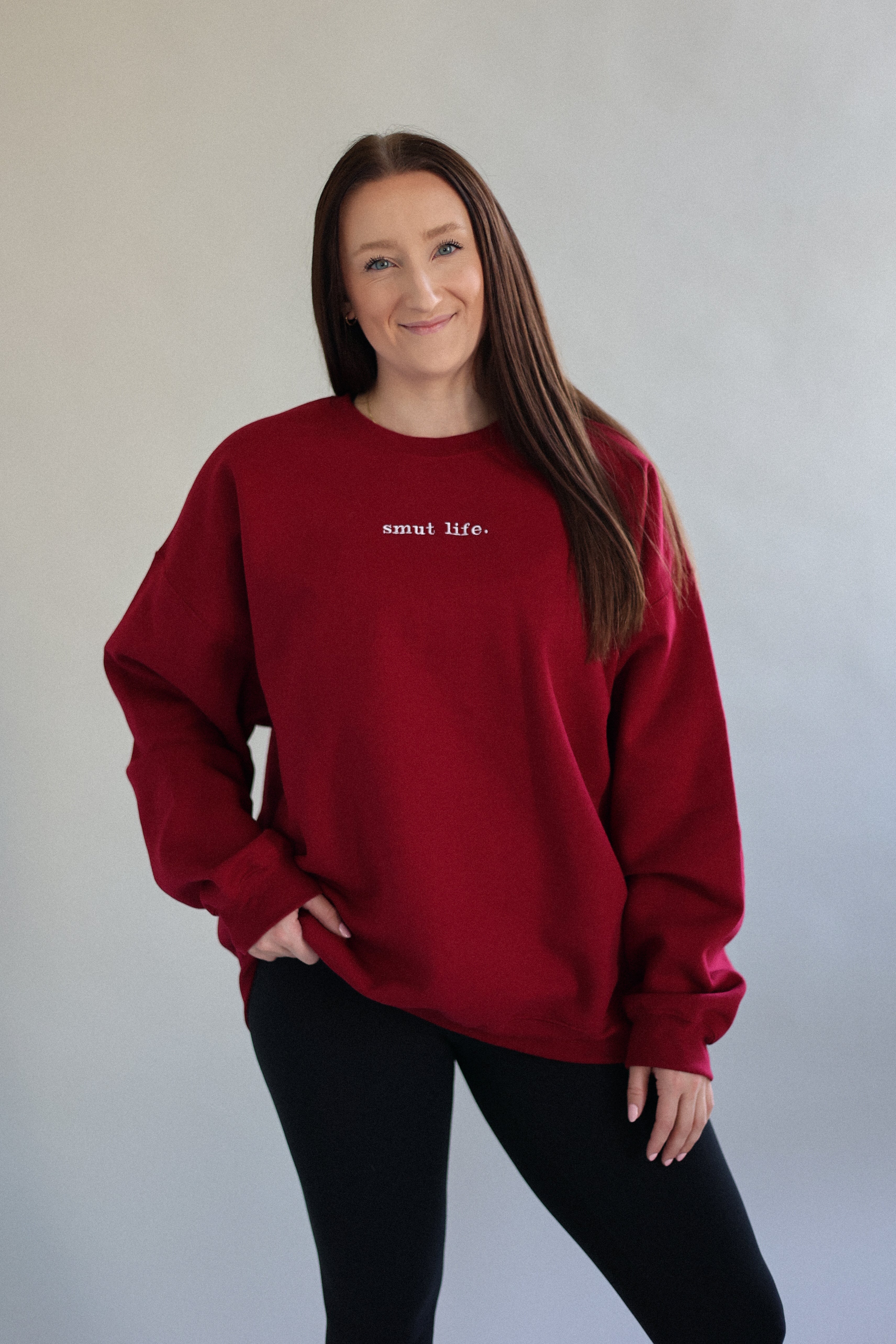 smut life. oversized crewneck in red flag (deep red)